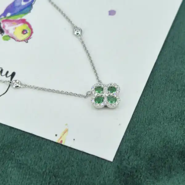 18ct White Gold Diamond and Emerald Clover Style Pendant-emerald-diamond-clover-necklace-white-gold.webp