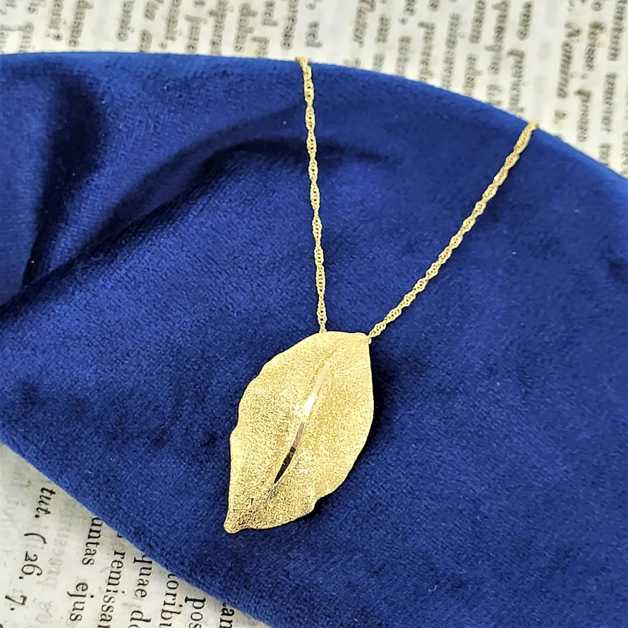 18ct Gold Leaf Pendant & Chain-frosted-gold-leaf-pendant.webp