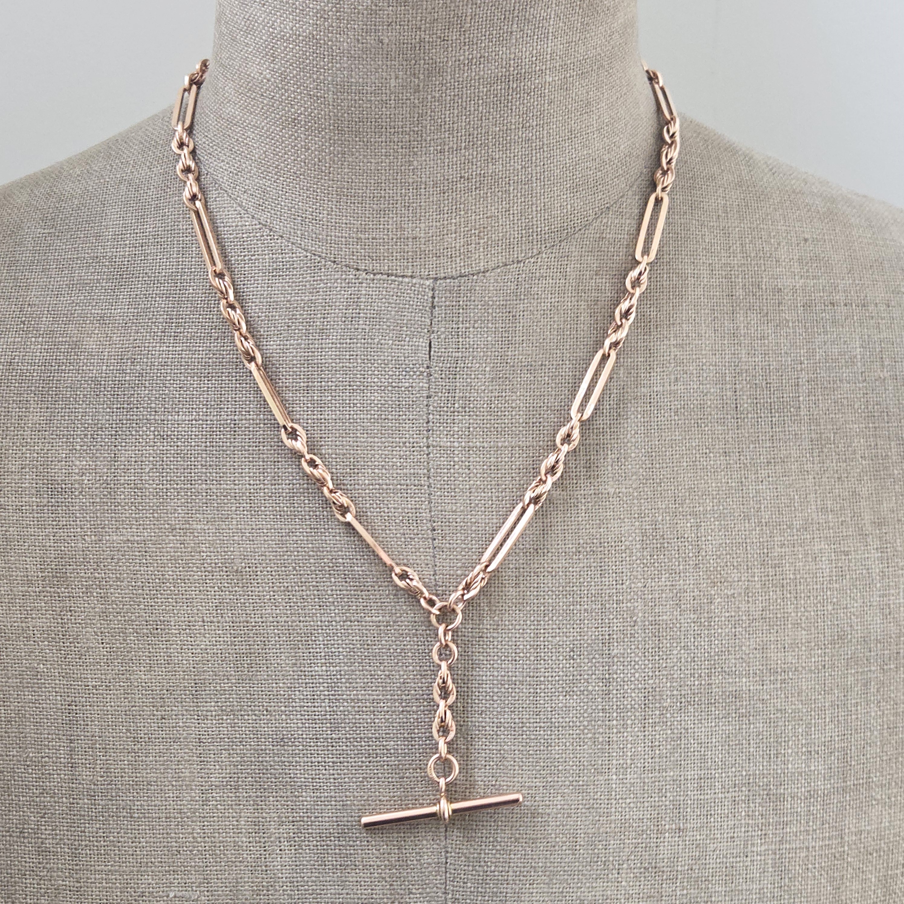 img/jewellery/necklacesrose-gold-trombone-and-rope-link-albert-chain.jpg
