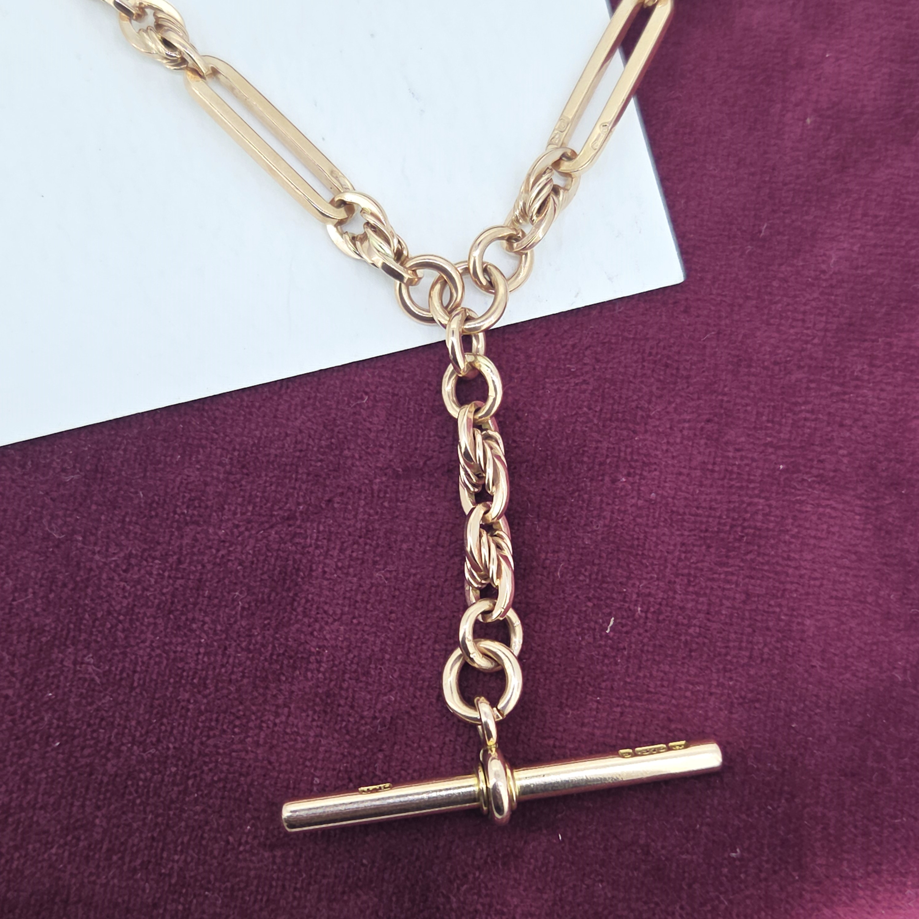 img/jewellery/necklacesrose-gold-trombone-and-rope-link-albert-chain.jpg