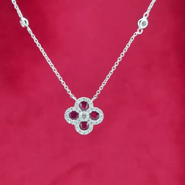 18ct White Gold Diamond and Ruby Clover Style Pendant-ruby-and-diamond-clover-pendant-in-white-gold.webp