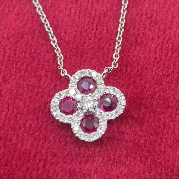 18ct White Gold Diamond and Ruby Clover Style Pendant-ruby-and-diamond-clover-pendant-in-white-gold.webp