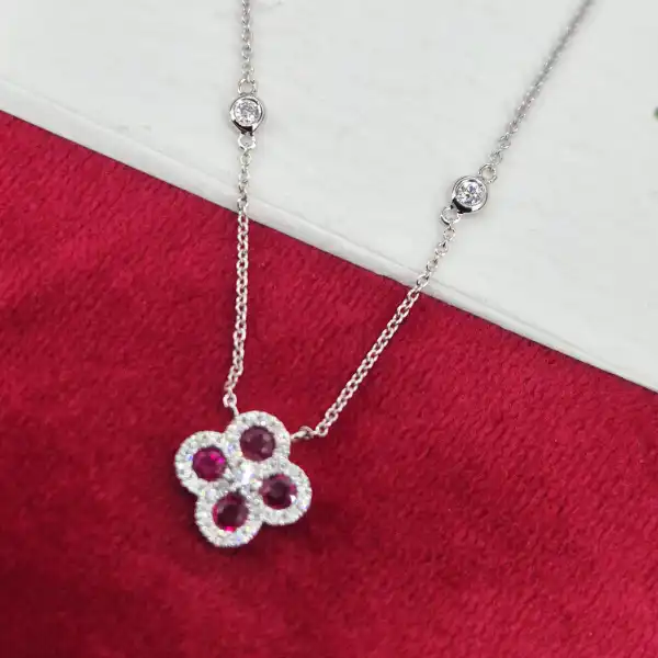 18ct White Gold Diamond and Ruby Clover Style Pendant-ruby-and-diamond-clover-pendant-in-white-gold.webp