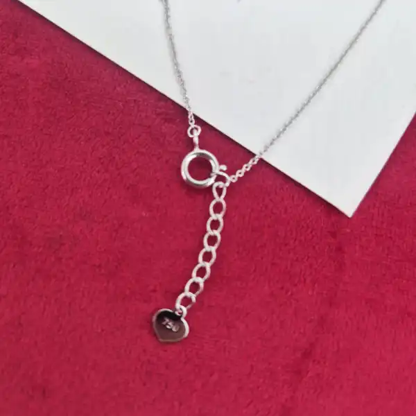 18ct White Gold Diamond and Ruby Clover Style Pendant-ruby-and-diamond-clover-pendant-in-white-gold.webp