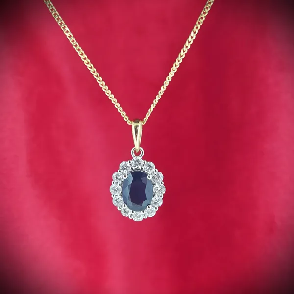 Sapphire & Diamond Halo Pendant in 18ct White Gold