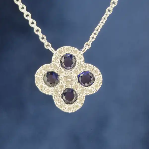 18ct White Gold Diamond and Sapphire Clover Style Pendant-sapphire-diamond-clover-necklace-in-white-gold.webp