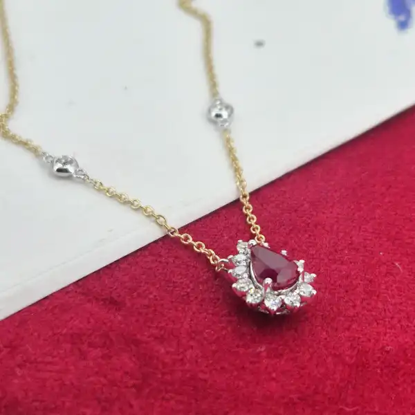 18ct Yellow Gold Diamond and Ruby Tear Drop Pendant-tear-drop-ruby-and-diamond-pendant-in-yellow-gold.webp