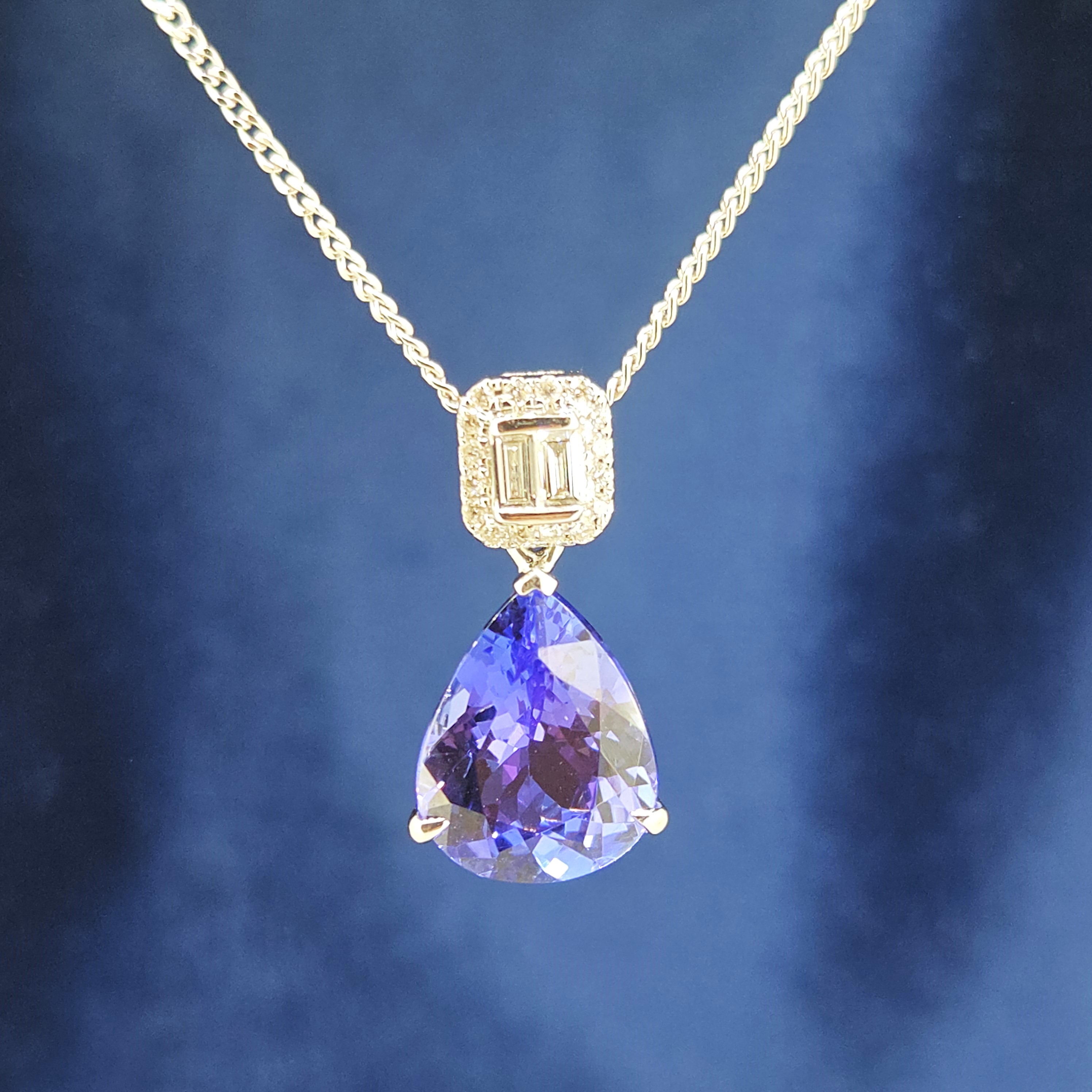 img/jewellery/necklaceswhite-gold-tanzanite-diamond-pear-shape-pendant.jpg
