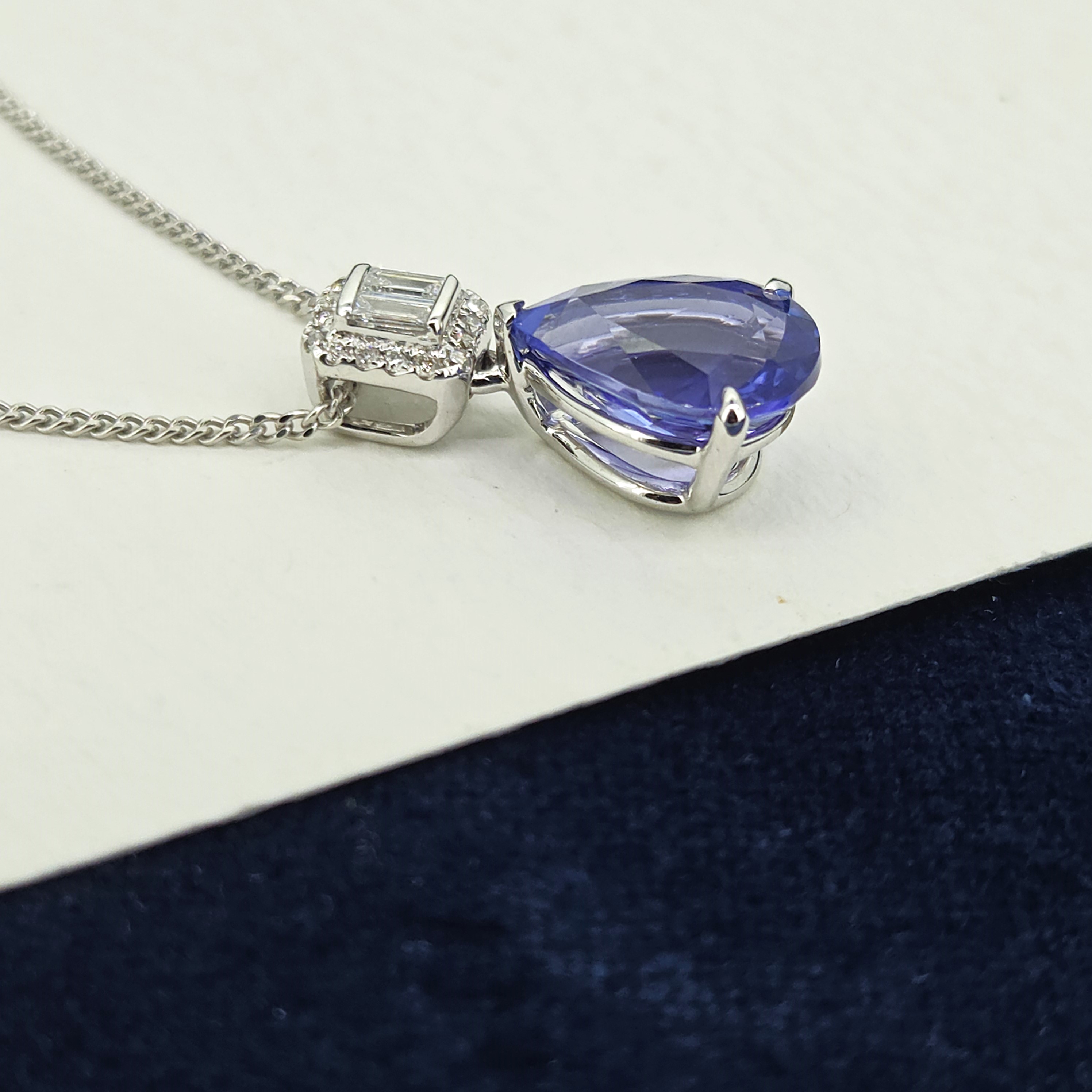 img/jewellery/necklaceswhite-gold-tanzanite-diamond-pear-shape-pendant.jpg
