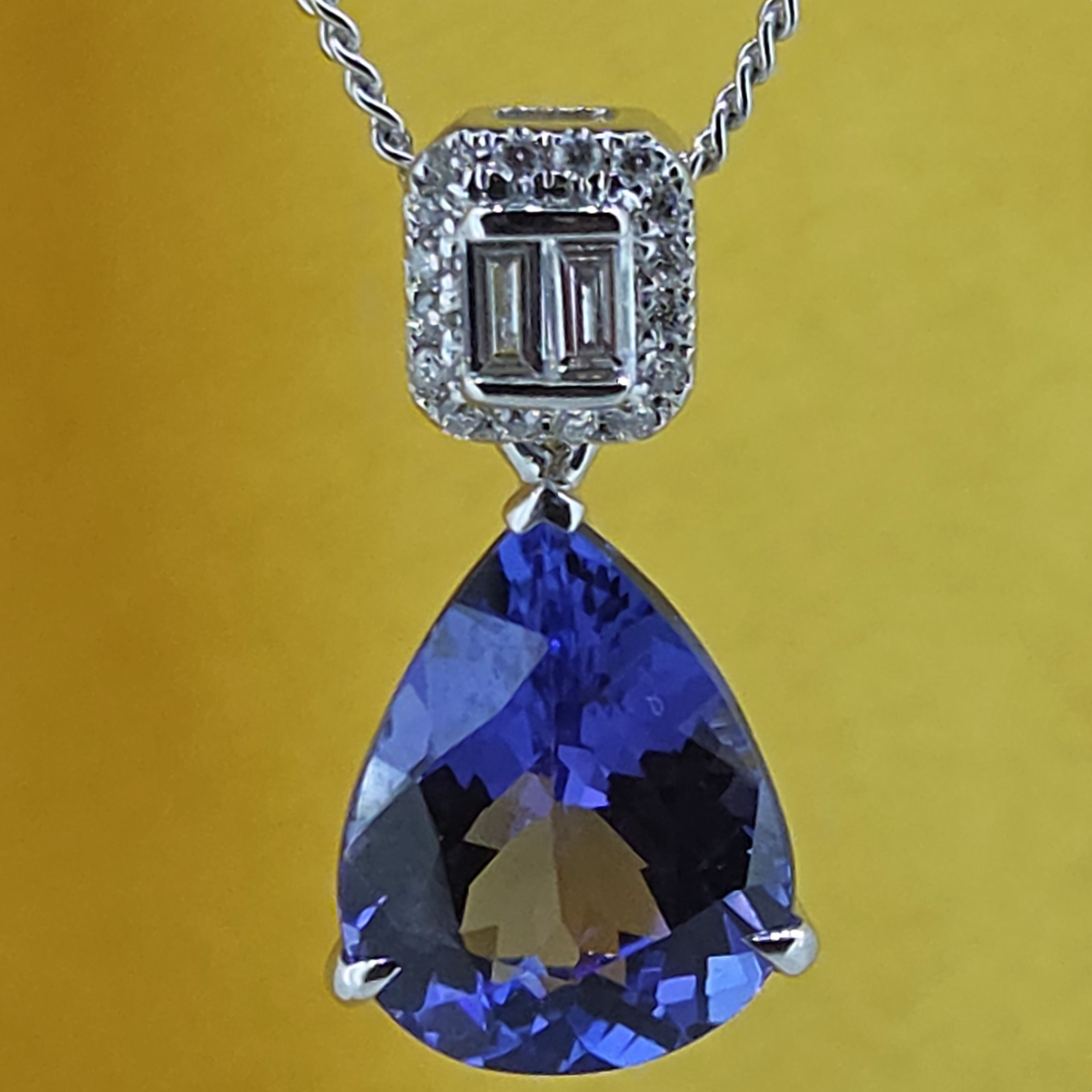 img/jewellery/necklaceswhite-gold-tanzanite-diamond-pear-shape-pendant.jpg
