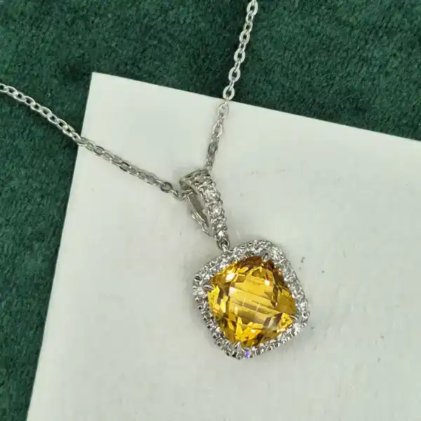 Striking 18ct White Gold Citrine and Diamond Halo Pendant -diamond-and-citrine-halo-pendant.webp