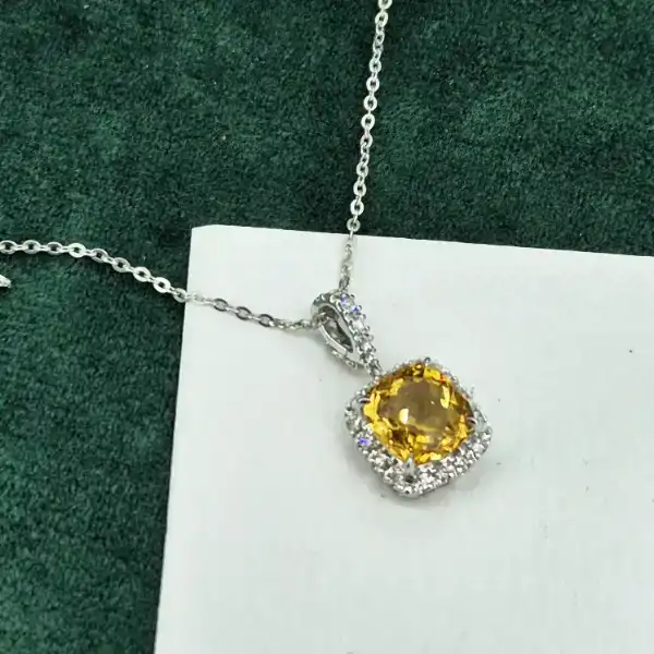 Striking 18ct White Gold Citrine and Diamond Halo Pendant -diamond-and-citrine-halo-pendant.webp