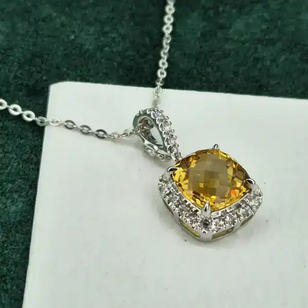 Striking 18ct White Gold Citrine and Diamond Halo Pendant -diamond-and-citrine-halo-pendant.webp