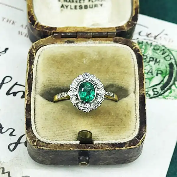 Fancy Emerald and Diamond Cluster Ring-18ct-emerald-and-diamond-rub-over-set-ring.webp