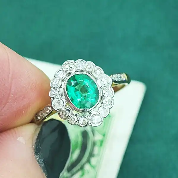 Fancy Emerald and Diamond Cluster Ring-18ct-emerald-and-diamond-rub-over-set-ring.webp