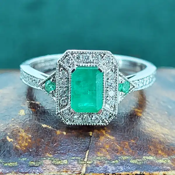 18ct White Gold Emerald & Diamond Ring-18ct-emerald-diamond-art-deco-cluster-ring.webp