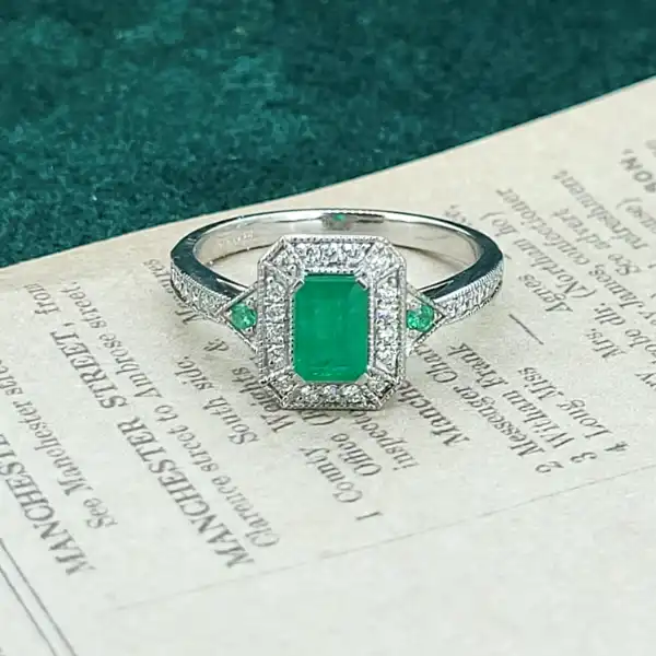 18ct White Gold Emerald & Diamond Ring-18ct-emerald-diamond-art-deco-cluster-ring.webp