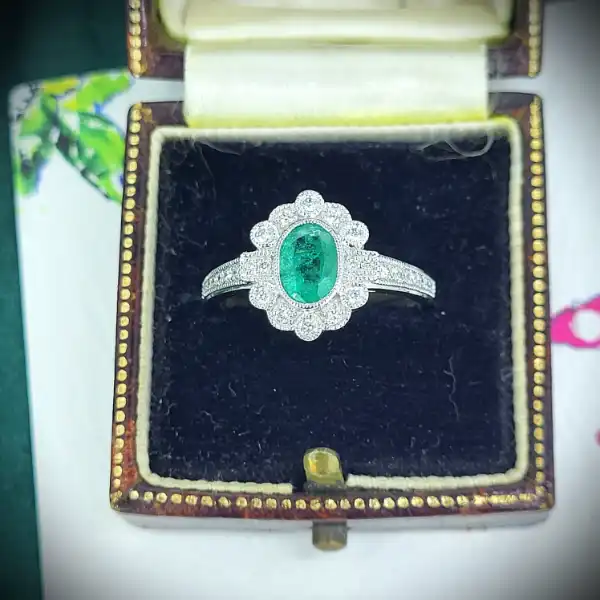 diamond Stock: 18ct White Gold Emerald & Diamond Cluster Ring