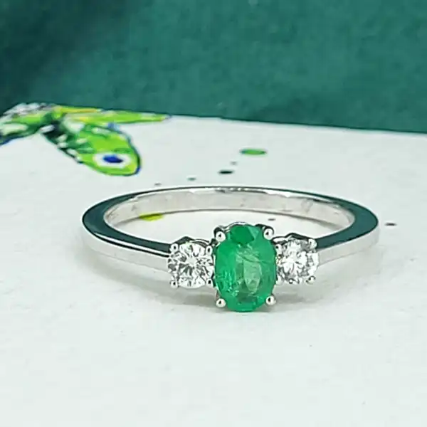 18ct White Gold Emerald & Diamond Trilogy Ring-18ct-emerald-diamond-trilogy-ring.webp