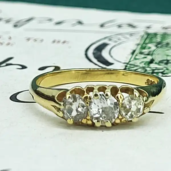 18ct Yellow Gold Old Cut Three Stone Ring weighing 0.80cts-18ct-gold-old-cut-three-stone-ring.webp