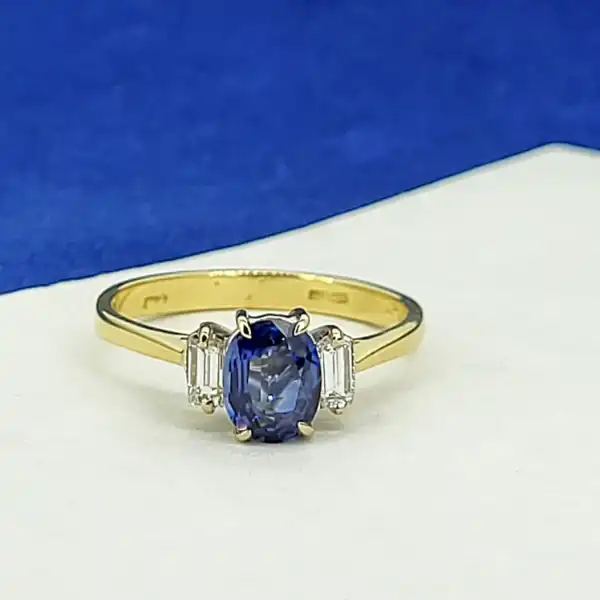 Sapphire and Diamond Three Stone Ring-18ct-plat-sapphire-diamond-trilogy-ring.webp