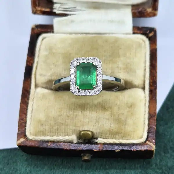 18ct White Gold Emerald and Diamond Halo Ring-18ct-white-emerald-diamond-halo-ring.webp