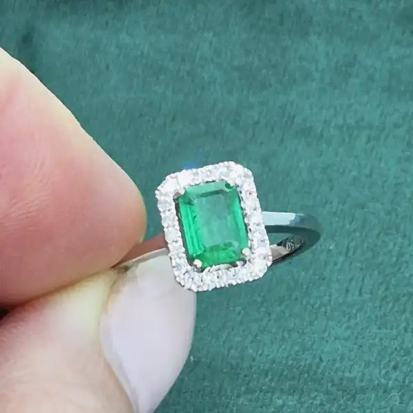 18ct White Gold Emerald and Diamond Halo Ring-18ct-white-emerald-diamond-halo-ring.webp