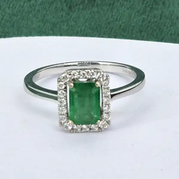 18ct White Gold Emerald and Diamond Halo Ring-18ct-white-emerald-diamond-halo-ring.webp