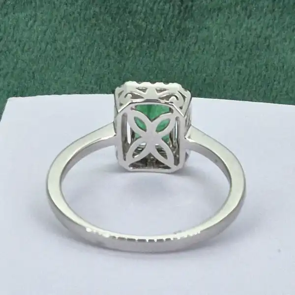 18ct White Gold Emerald and Diamond Halo Ring-18ct-white-emerald-diamond-halo-ring.webp