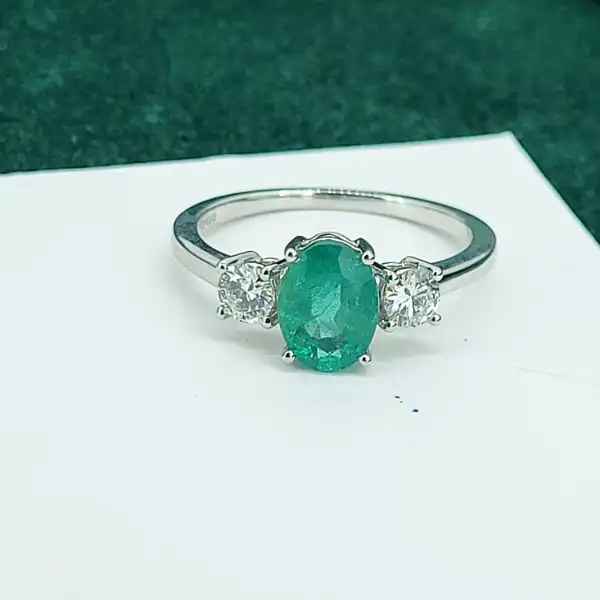 18ct Emerald & Diamond Three Stone Ring-18ct-white-gold-emerald-diamond-trilogy-ring.webp