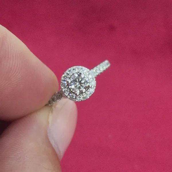 Halo Style Diamond Ring with Diamond Shoulders-18ct-white-gold-round-diamond-halo-ring.webp