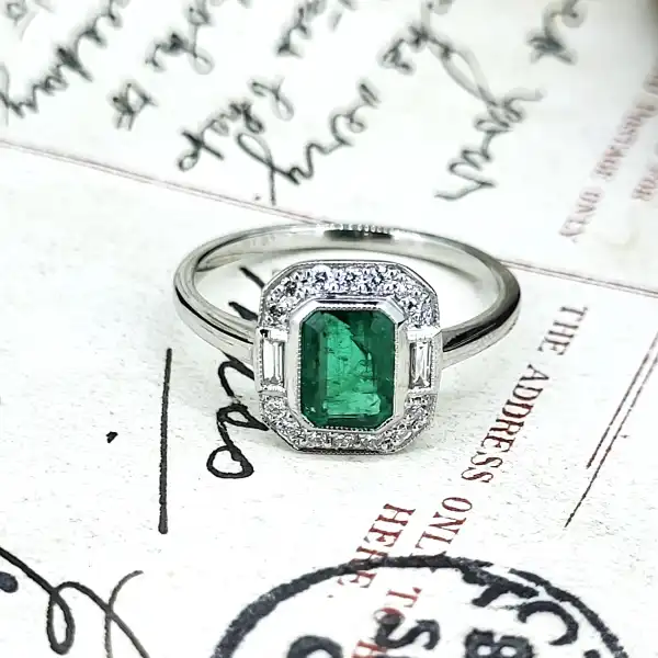 Platinum Emerald and Diamond Ring-art-deco-emerald-cut-emerald-dia-cluster.webp
