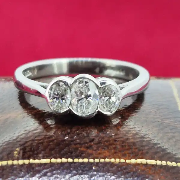 18ct White Gold Oval Three Stone Diamond Ring-oval-three-stone-rubover-diamond-ring.webp