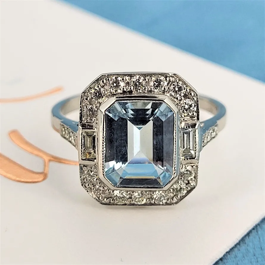 A Stunning Platinum Aquamarine & Diamond Ring-emerald-cur-aquamarine-art-deco-inspired-ring.webp