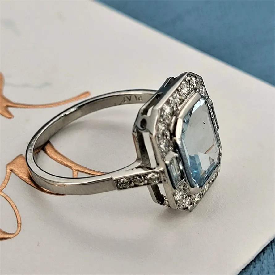A Stunning Platinum Aquamarine & Diamond Ring-emerald-cur-aquamarine-art-deco-inspired-ring.webp