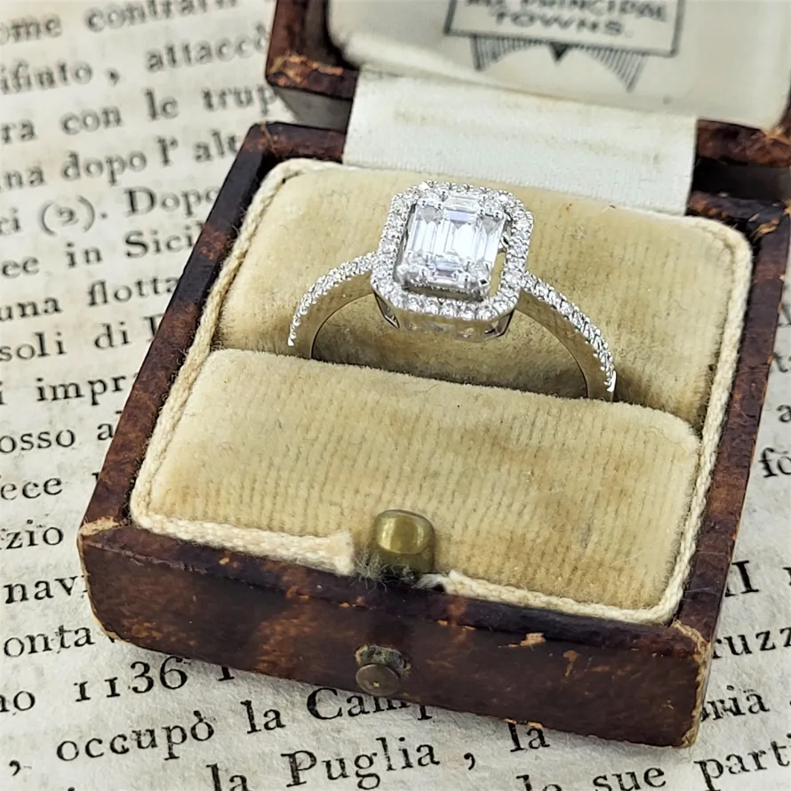 Platinum Halo Diamond Ring weighing 1.50cts-illusion-set-emerald-cut-ring.webp