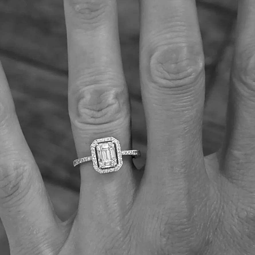Platinum Halo Diamond Ring weighing 1.50cts-illusion-set-emerald-cut-ring.webp