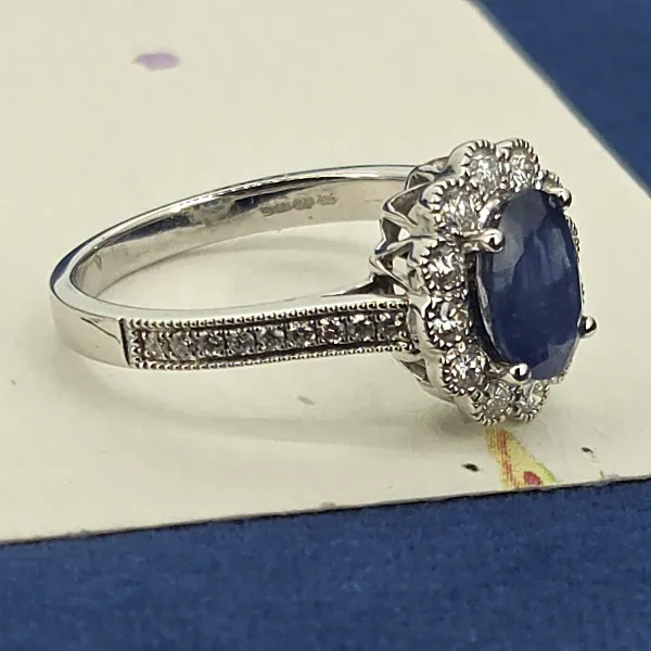 Diamond and Sapphire Ring in 18ct White Gold- Magnified 
