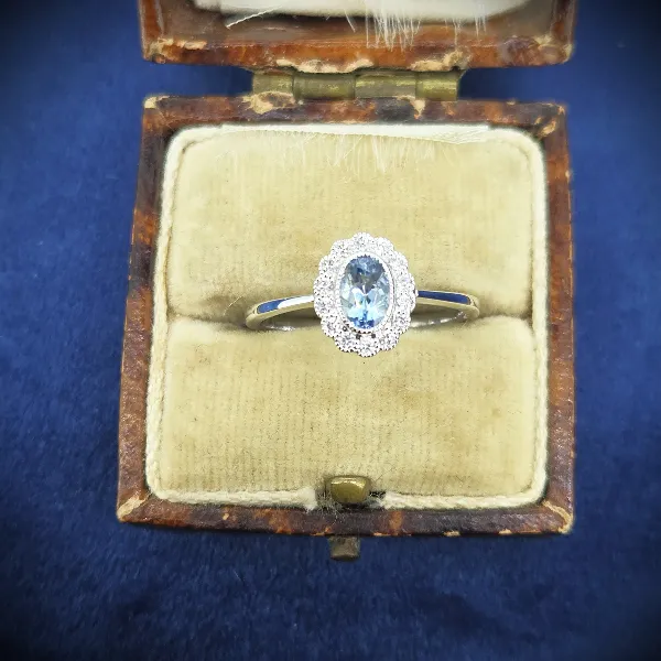 Aquamarine & Diamond Cluster in 18ct White Gold-oval-aquamarine-cluster-ring-with-milgrain.webp