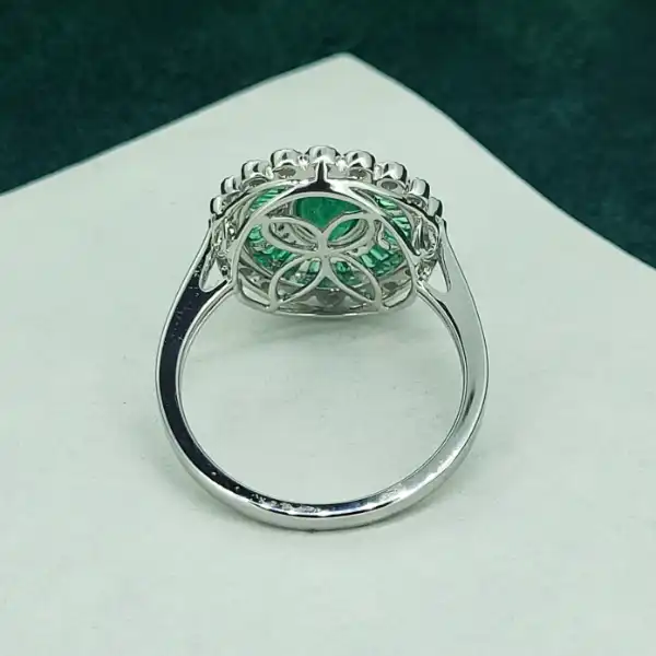 18ct White Gold Emerald & Diamond Ring-oval-emerald-diamond-art-deco-ring-white-gold.webp