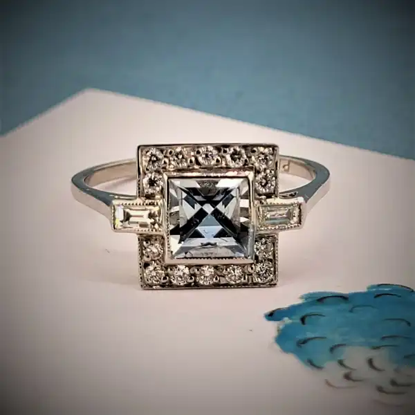 Striking Platinum Art Deco Style Aquamarine and Diamond Ring -plat-pcut-aqua-dia-ring.webp