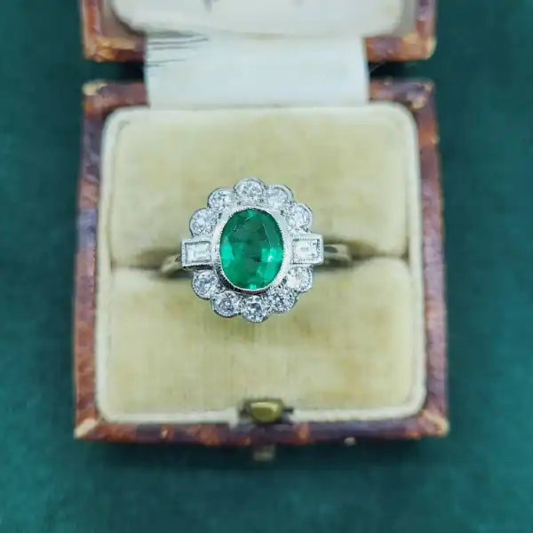 Emerald and Diamond Ring in Platinum-platinum-emerald-and-diamond-art-deco-cluster-ring.webp