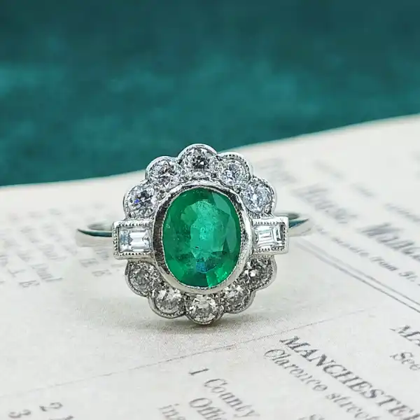 Emerald and Diamond Ring in Platinum-platinum-emerald-and-diamond-art-deco-cluster-ring.webp