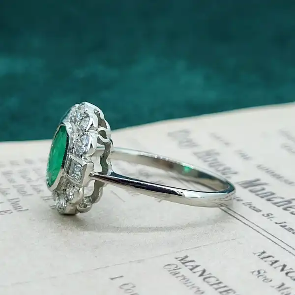 Emerald and Diamond Ring in Platinum-platinum-emerald-and-diamond-art-deco-cluster-ring.webp