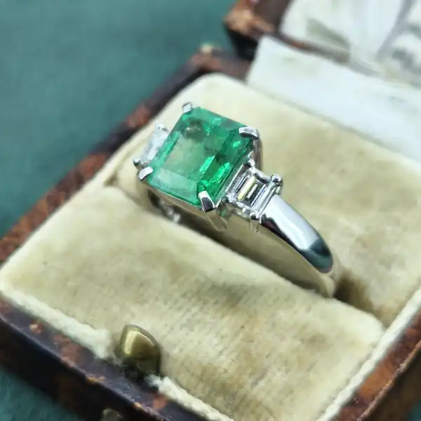 Emerald and Diamond Ring Set in Platinum-platinum-emerald-cut-emerald-diamond-ring.webp