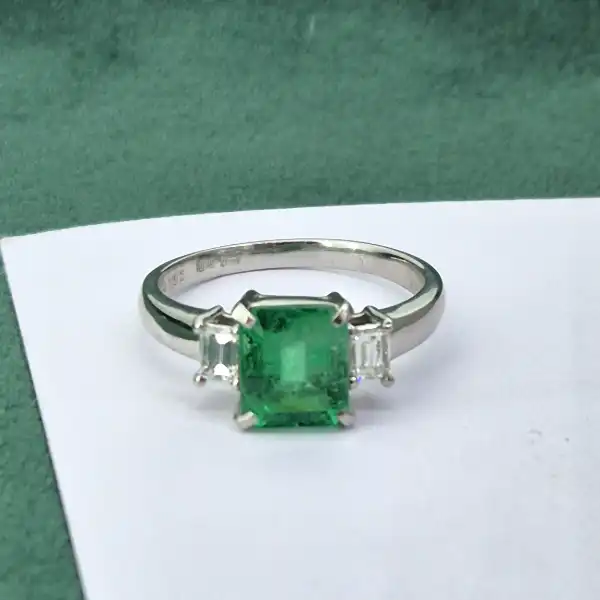 Emerald and Diamond Ring Set in Platinum-platinum-emerald-cut-emerald-diamond-ring.webp