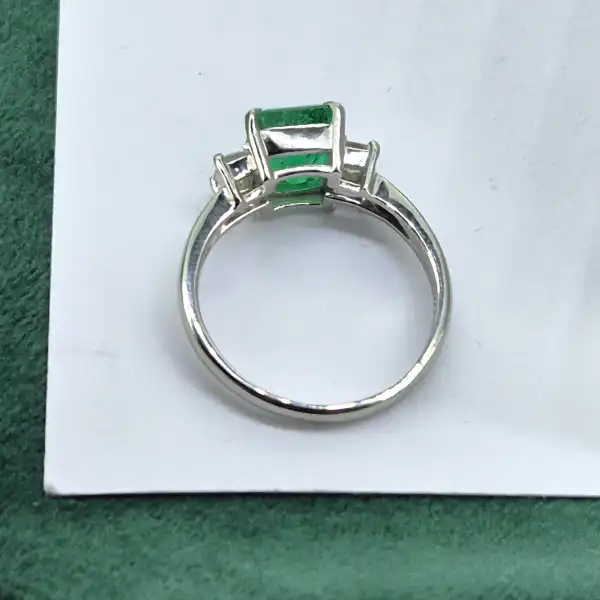 Emerald and Diamond Ring Set in Platinum-platinum-emerald-cut-emerald-diamond-ring.webp